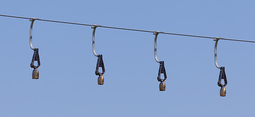 Image showing Alps cowbells on a skilift