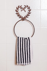 Image showing Ring shaped towel holder with towel