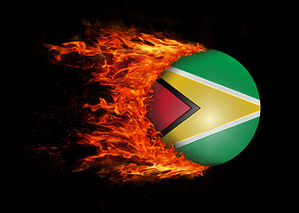 Image showing Flag with a trail of fire - Guyana