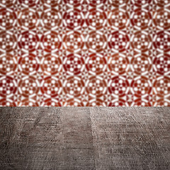 Image showing Wood table top and blur vintage ceramic tile pattern wall