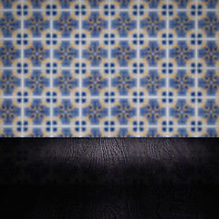 Image showing Wood table top and blur vintage ceramic tile pattern wall