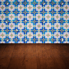 Image showing Wood table top and blur vintage ceramic tile pattern wall