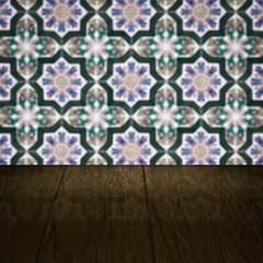 Image showing Wood table top and blur vintage ceramic tile pattern wall