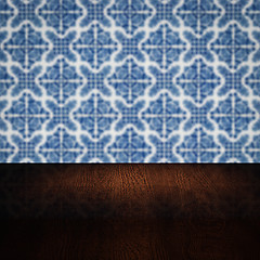 Image showing Wood table top and blur vintage ceramic tile pattern wall