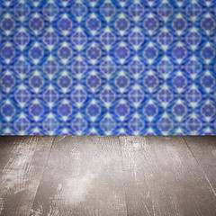 Image showing Wood table top and blur vintage ceramic tile pattern wall