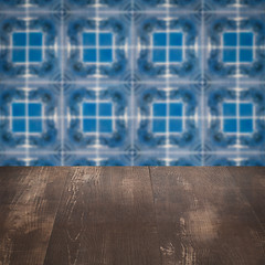 Image showing Wood table top and blur vintage ceramic tile pattern wall