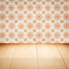 Image showing Wood table top and blur vintage ceramic tile pattern wall