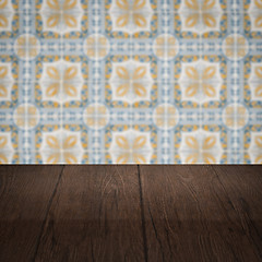 Image showing Wood table top and blur vintage ceramic tile pattern wall