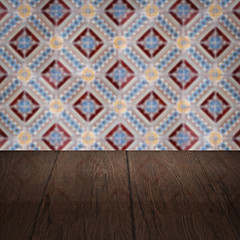 Image showing Wood table top and blur vintage ceramic tile pattern wall