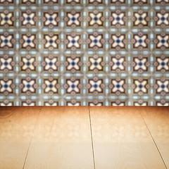 Image showing Wood table top and blur vintage ceramic tile pattern wall