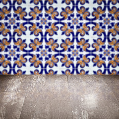 Image showing Wood table top and blur vintage ceramic tile pattern wall