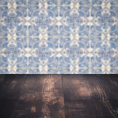 Image showing Wood table top and blur vintage ceramic tile pattern wall