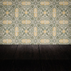 Image showing Wood table top and blur vintage ceramic tile pattern wall