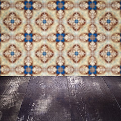 Image showing Wood table top and blur vintage ceramic tile pattern wall