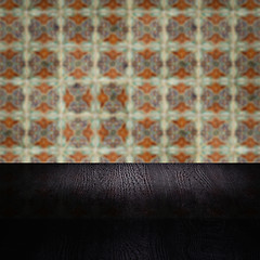 Image showing Wood table top and blur vintage ceramic tile pattern wall