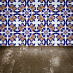 Image showing Wood table top and blur vintage ceramic tile pattern wall