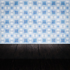 Image showing Wood table top and blur vintage ceramic tile pattern wall