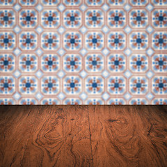 Image showing Wood table top and blur vintage ceramic tile pattern wall