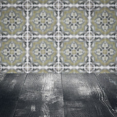 Image showing Wood table top and blur vintage ceramic tile pattern wall