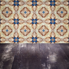 Image showing Wood table top and blur vintage ceramic tile pattern wall