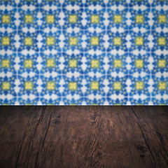 Image showing Wood table top and blur vintage ceramic tile pattern wall