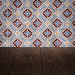 Image showing Wood table top and blur vintage ceramic tile pattern wall