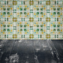 Image showing Wood table top and blur vintage ceramic tile pattern wall