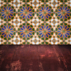 Image showing Wood table top and blur vintage ceramic tile pattern wall