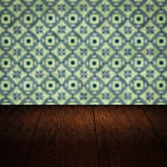 Image showing Wood table top and blur vintage ceramic tile pattern wall