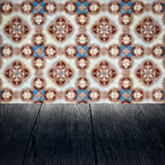 Image showing Wood table top and blur vintage ceramic tile pattern wall