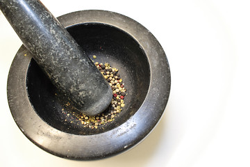Image showing grinding peppercorns