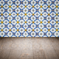 Image showing Wood table top and blur vintage ceramic tile pattern wall