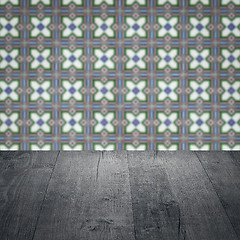 Image showing Wood table top and blur vintage ceramic tile pattern wall