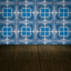 Image showing Wood table top and blur vintage ceramic tile pattern wall