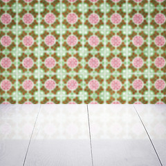 Image showing Wood table top and blur vintage ceramic tile pattern wall