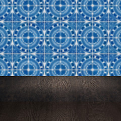 Image showing Wood table top and blur vintage ceramic tile pattern wall