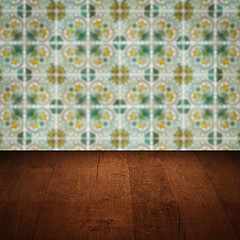 Image showing Wood table top and blur vintage ceramic tile pattern wall