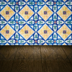 Image showing Wood table top and blur vintage ceramic tile pattern wall