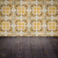 Image showing Wood table top and blur vintage ceramic tile pattern wall