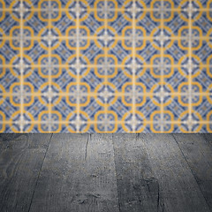 Image showing Wood table top and blur vintage ceramic tile pattern wall