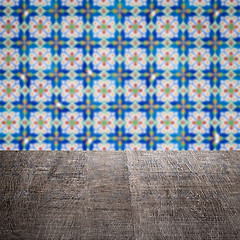 Image showing Wood table top and blur vintage ceramic tile pattern wall