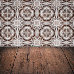 Image showing Wood table top and blur vintage ceramic tile pattern wall