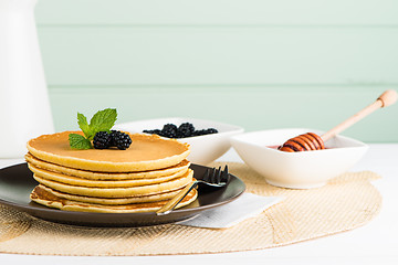 Image showing Pancakes with fresh blackberries