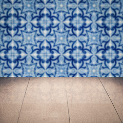 Image showing Wood table top and blur vintage ceramic tile pattern wall