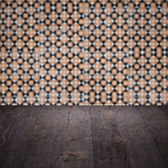 Image showing Wood table top and blur vintage ceramic tile pattern wall