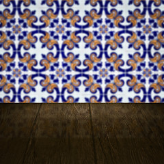 Image showing Wood table top and blur vintage ceramic tile pattern wall