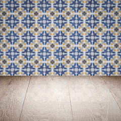 Image showing Wood table top and blur vintage ceramic tile pattern wall