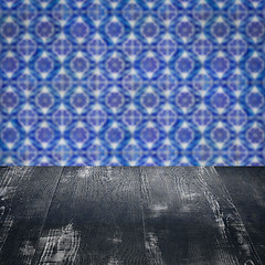 Image showing Wood table top and blur vintage ceramic tile pattern wall