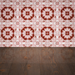 Image showing Wood table top and blur vintage ceramic tile pattern wall