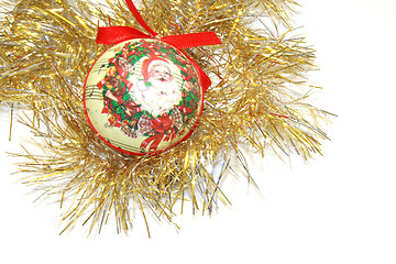 Image showing papiermache bauble and tinsel
